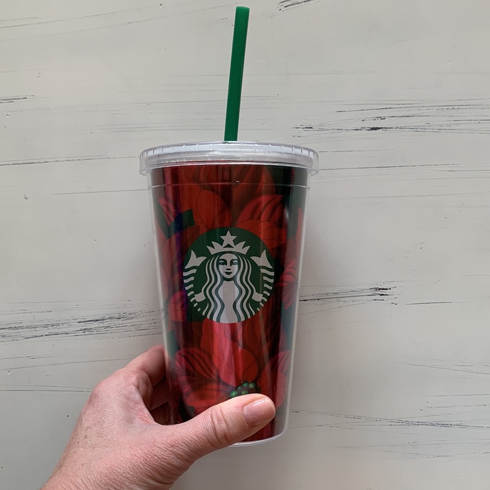 Starbucks poinsettia 16 oz plastic cup with green straw